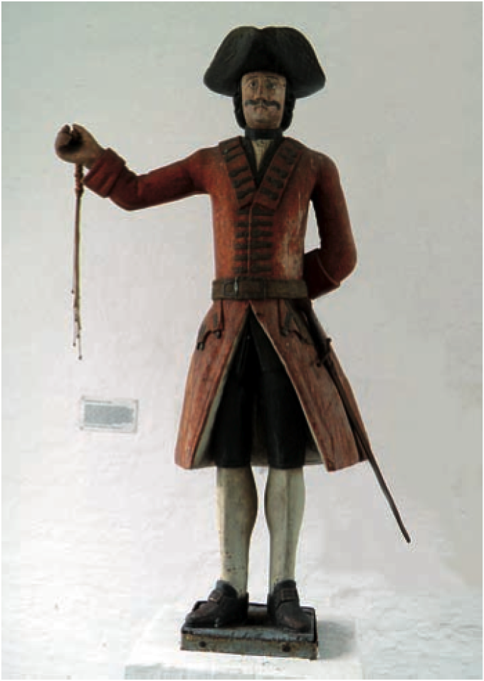 Kagmandsfigur fra Tønder, dateret til 1700-tallet. Den stod på byens kag, den pæl på torvet, som forbryderen blev bundet til ved piskestraf. Figuren står nu i Porthuset ved Museum Sønderjylland - Kulturhistorie Tønder. Kagmandsfigur fra Tønder, dateret til 1700-tallet. Den stod på byens kag, den pæl på torvet, som forbryderen blev bundet til ved piskestraf. Figuren står nu i Porthuset ved Museum Sønderjylland - Kulturhistorie Tønder.